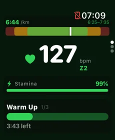 Apple Watch live pace coaching with real-time pace bar and warm-up timer